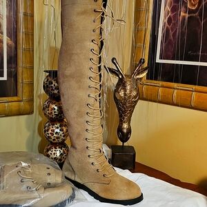 Laced up knee high, seude boots